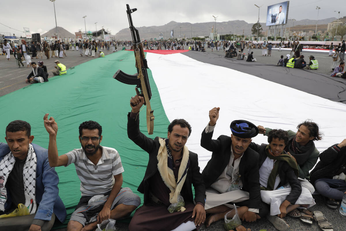Houthi supporters attend a rally against the U.S. airstrikes on Yemen and the Israeli offensive ...