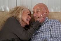 World War II veteran Harold Terens, 100, right, and Jeanne Swerlin, 96, snuggle during an inter ...