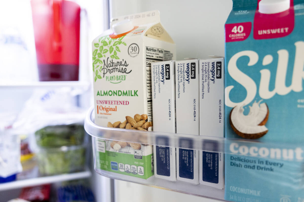 Doses of Wegovy, a drug used for weight loss, are stored in a refrigerator at Donna Cooper's ho ...