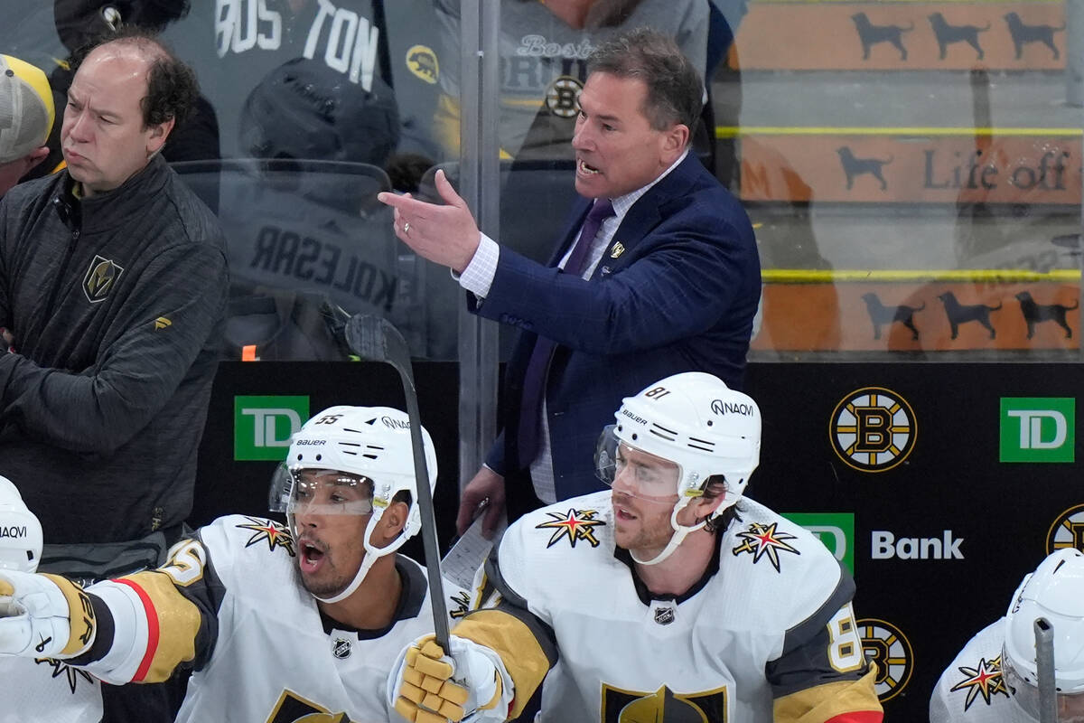 Vegas Golden Knights head coach Bruce Cassidy, top right, shouts from behind the bench in the s ...
