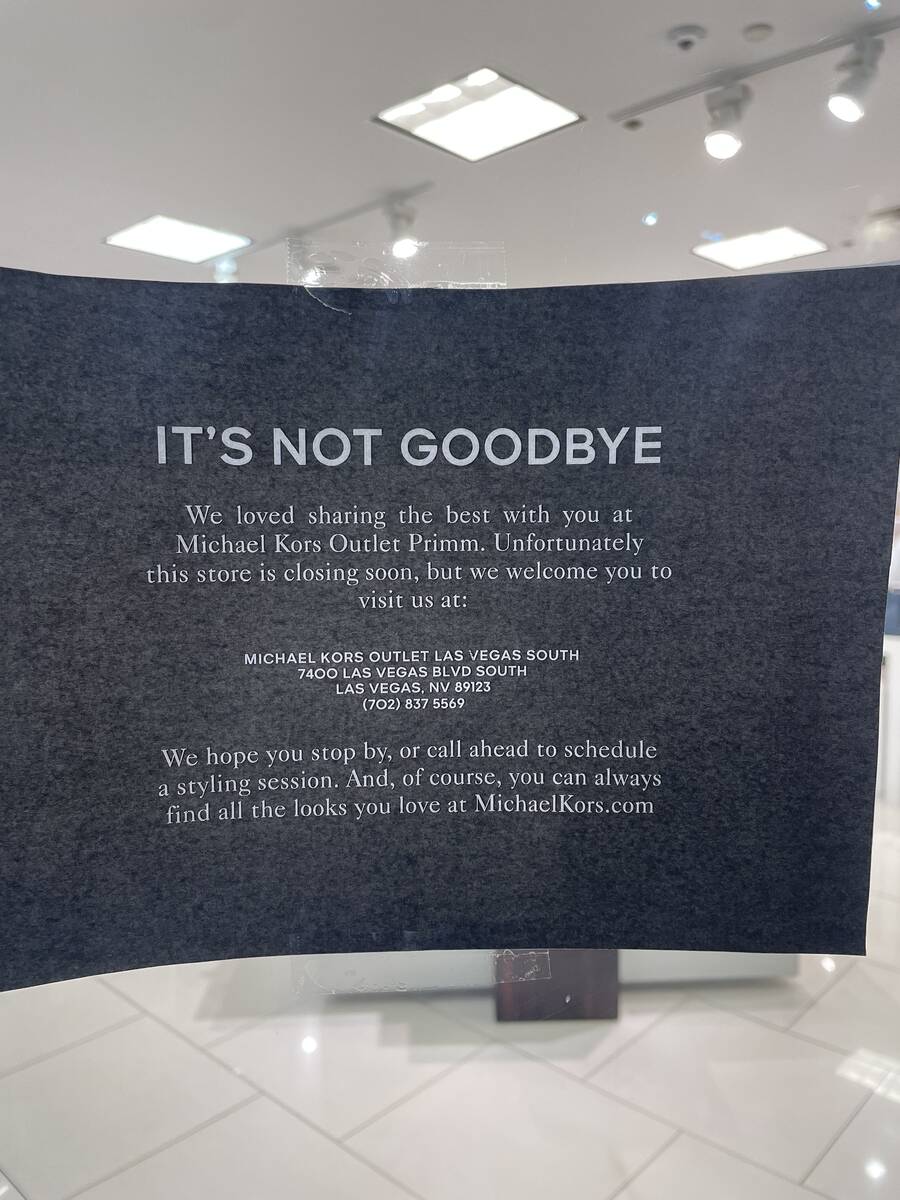 A sign at the Michael Kors outlet location in the Primm Mall on March 15, 2024, says the store ...
