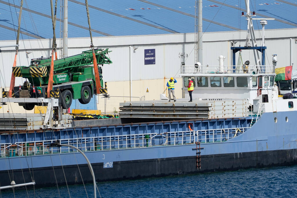 A crane loading on the ship with food aid from the U.S. charity World Central Kitchen and the U ...