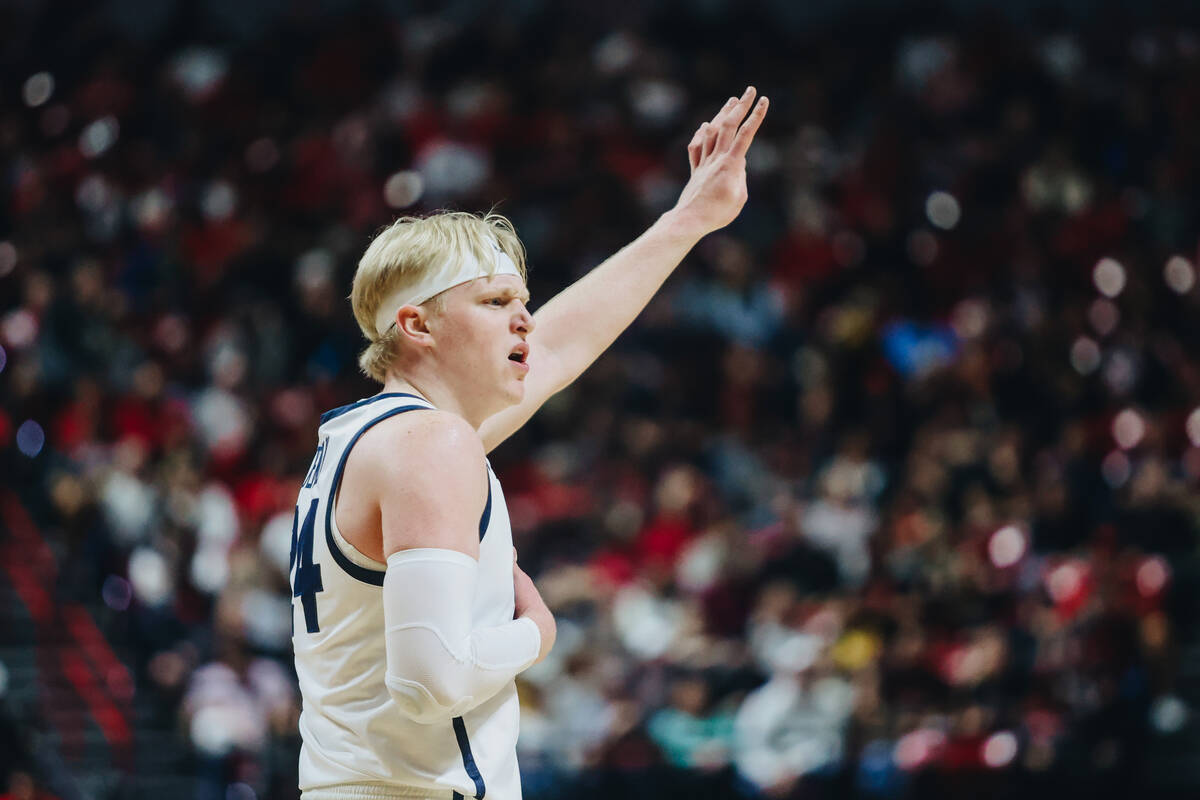 Utah State forward Karson Templin (24) reacts to a call during the Mountain West tournament at ...