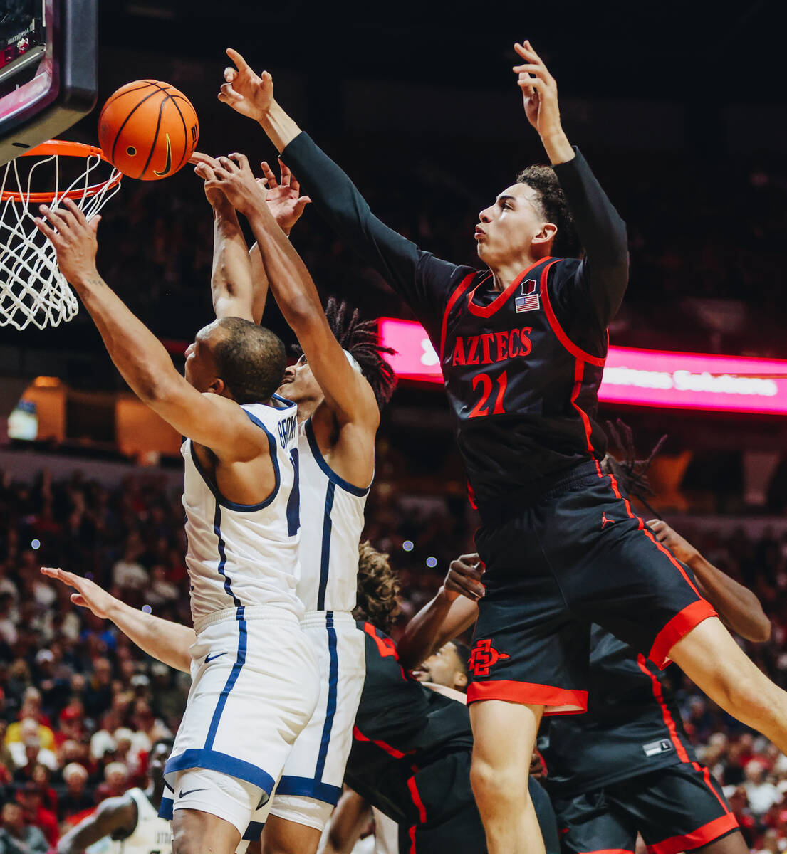 San Diego State guard Miles Byrd (21) attempts a layup during the Mountain West tournament at t ...