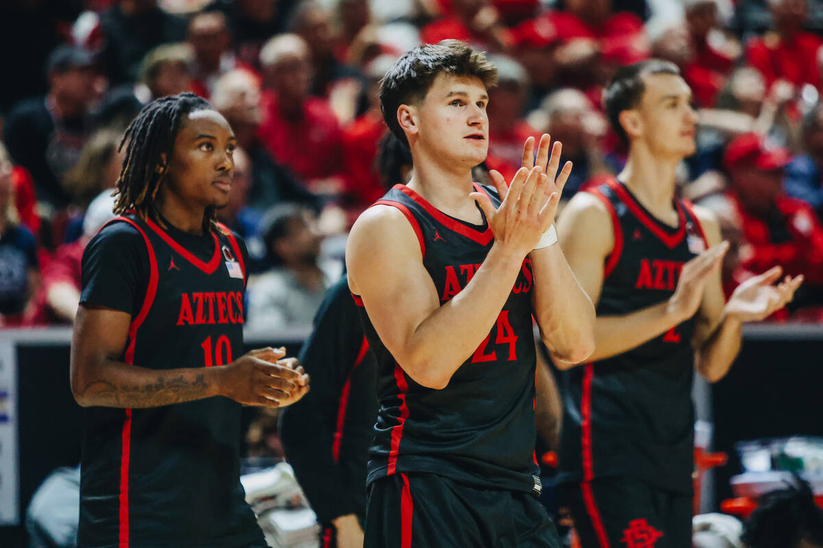 San Diego State guard Ryan Schwarz (24) claps for his teammates during the Mountain West tourna ...