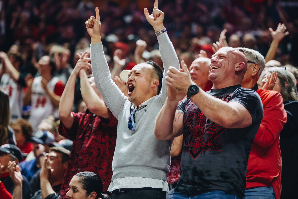 San Diego State fans cheer at a game against Utah State during the Mountain West tournament at ...