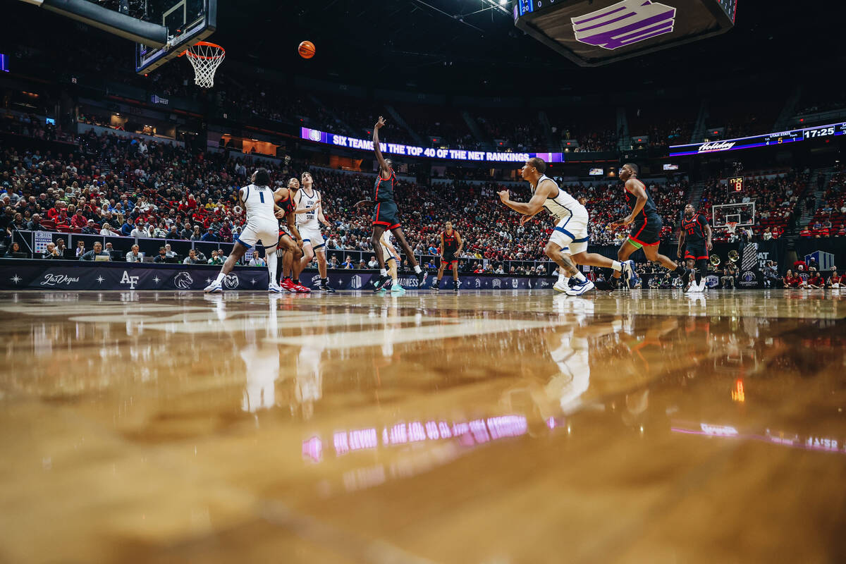 A basketball game between San Diego State and Utah State takes place during the Mountain West t ...