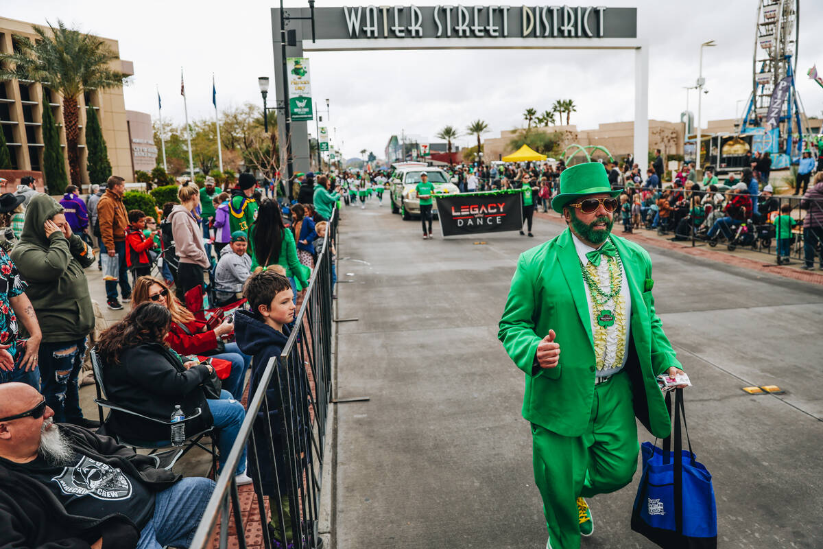 The St. Patrick’s Day parade makes its way through Water Street on Saturday, March 16, 2 ...