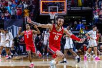 New Mexico Lobos guard Jaelen House (10) runs down the court in celebration of a win as time ru ...