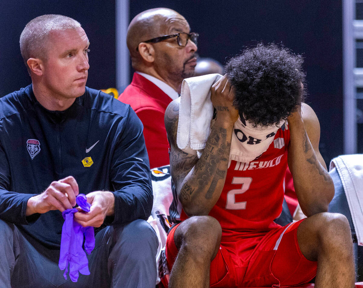 New Mexico Lobos guard Donovan Dent (2) sits on the bench feeling ill after playing as much as ...