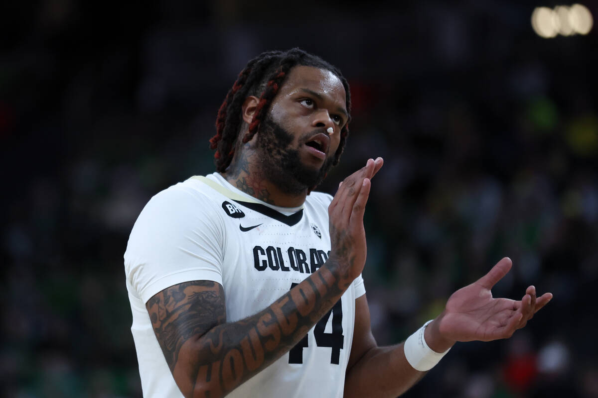 Colorado Buffaloes center Eddie Lampkin Jr. (44) claps during the first half of the championshi ...