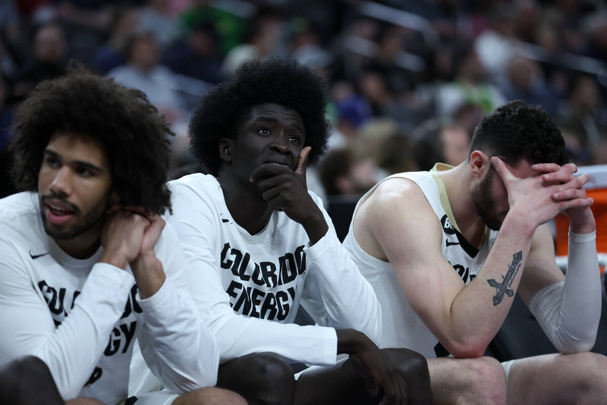 Colorado Buffaloes players grimace on the bench after Oregon Ducks scored during the second hal ...
