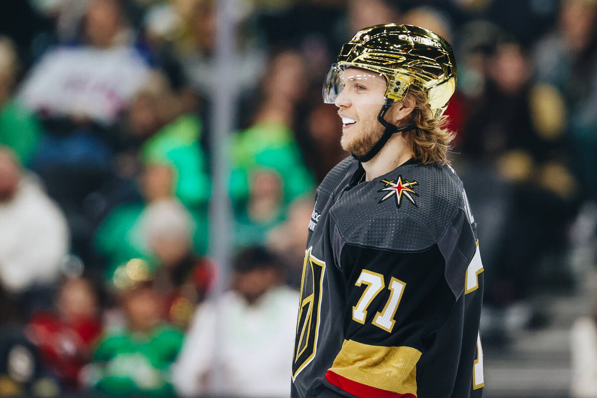 Golden Knights center William Karlsson (71) smiles at a teammate during an NHL game between the ...