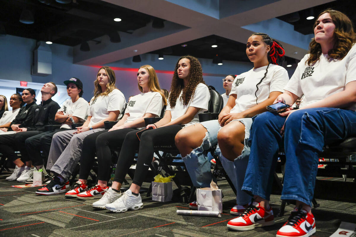Members of the UNLV Lady Rebels basketball team watch the TV for the announcement of their plac ...