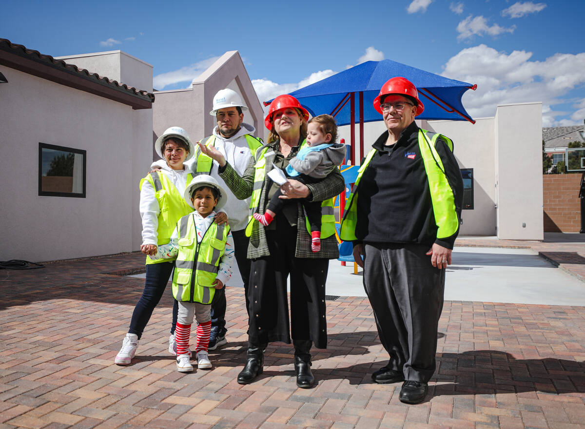 Alejandra Sandoval, from left, her husband Pablo Sandoval, their son Joshua Sandoval, 7, stand ...
