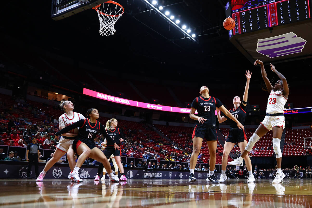 UNLV Lady Rebels center Desi-Rae Young (23) shoots over San Diego State Aztecs guard Sarah Barc ...