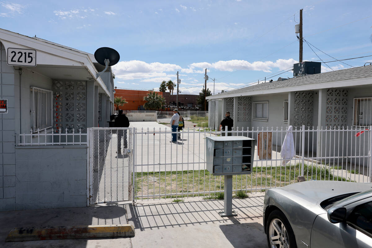 A security officer guards an apartment complex in the 2200 block of East Nelson Avenue in North ...