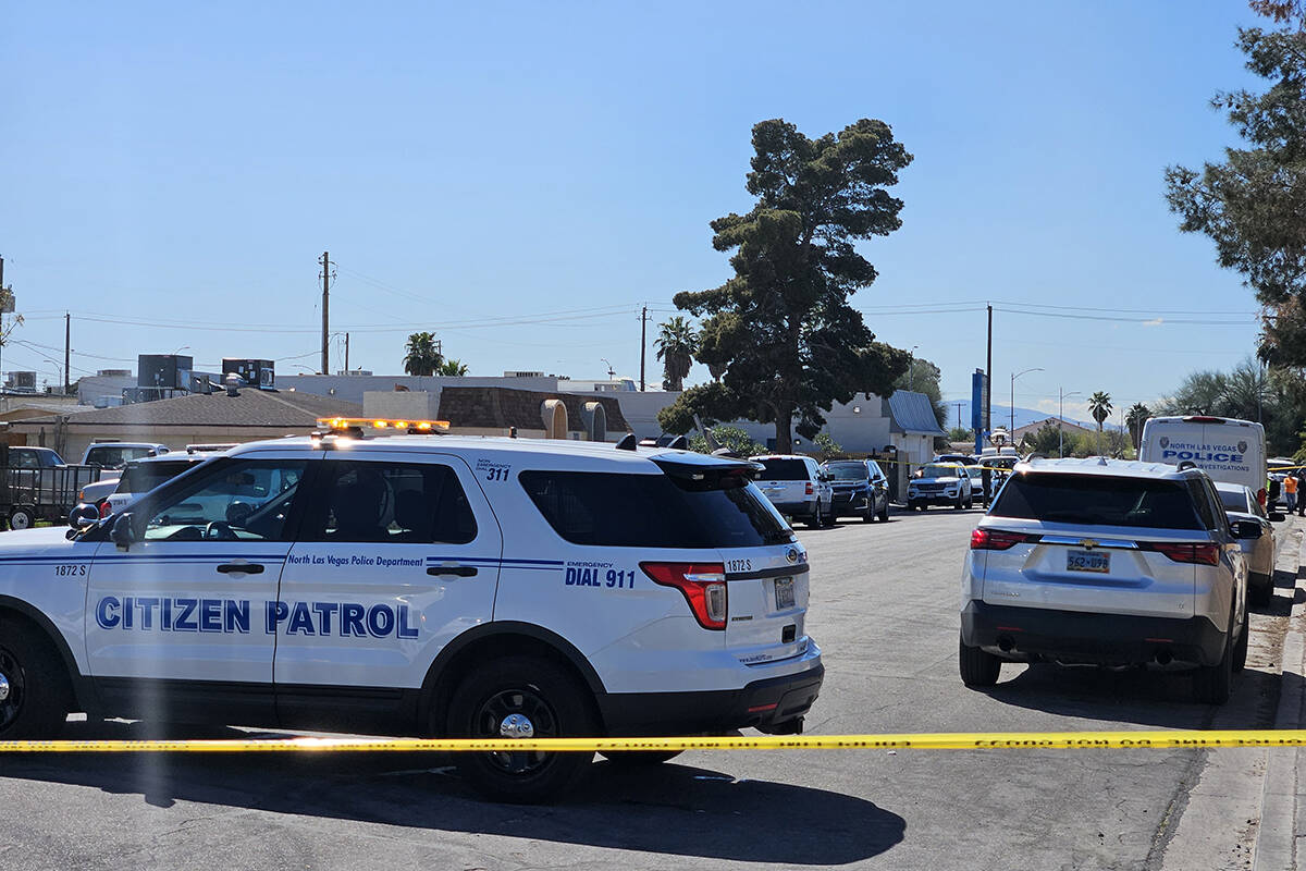 Police investigate the shooting deaths of two women Tuesday, March 19, 2024, on the 2000 block ...