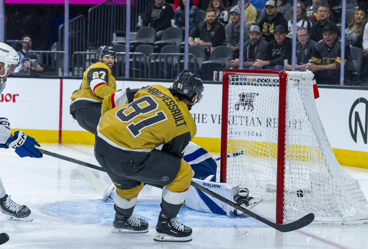 Golden Knights right wing Jonathan Marchessault (81) scores past Tampa Bay Lightning goaltender ...