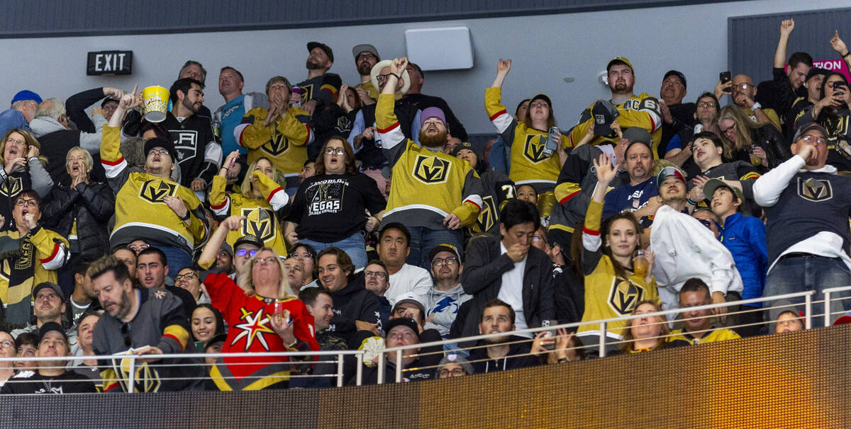 Golden Knights fans in the upper deck celebrate a goal against the Tampa Bay Lightning during t ...