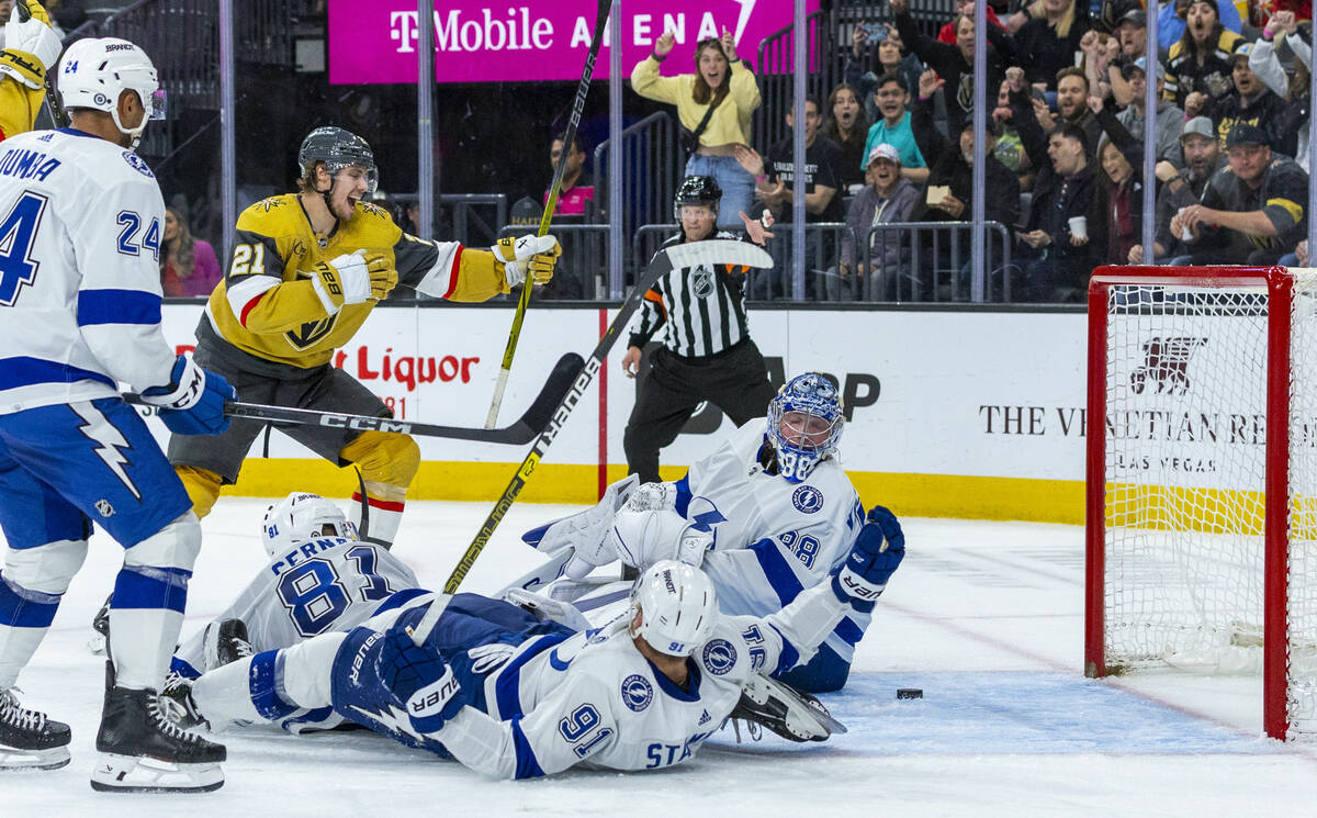 Golden Knights center Brett Howden (21) celebrates a score as it gets past Tampa Bay Lightning ...