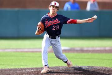 Liberty’s Nicholas Blakeney (29) throws the ball to first base during a baseball game against ...