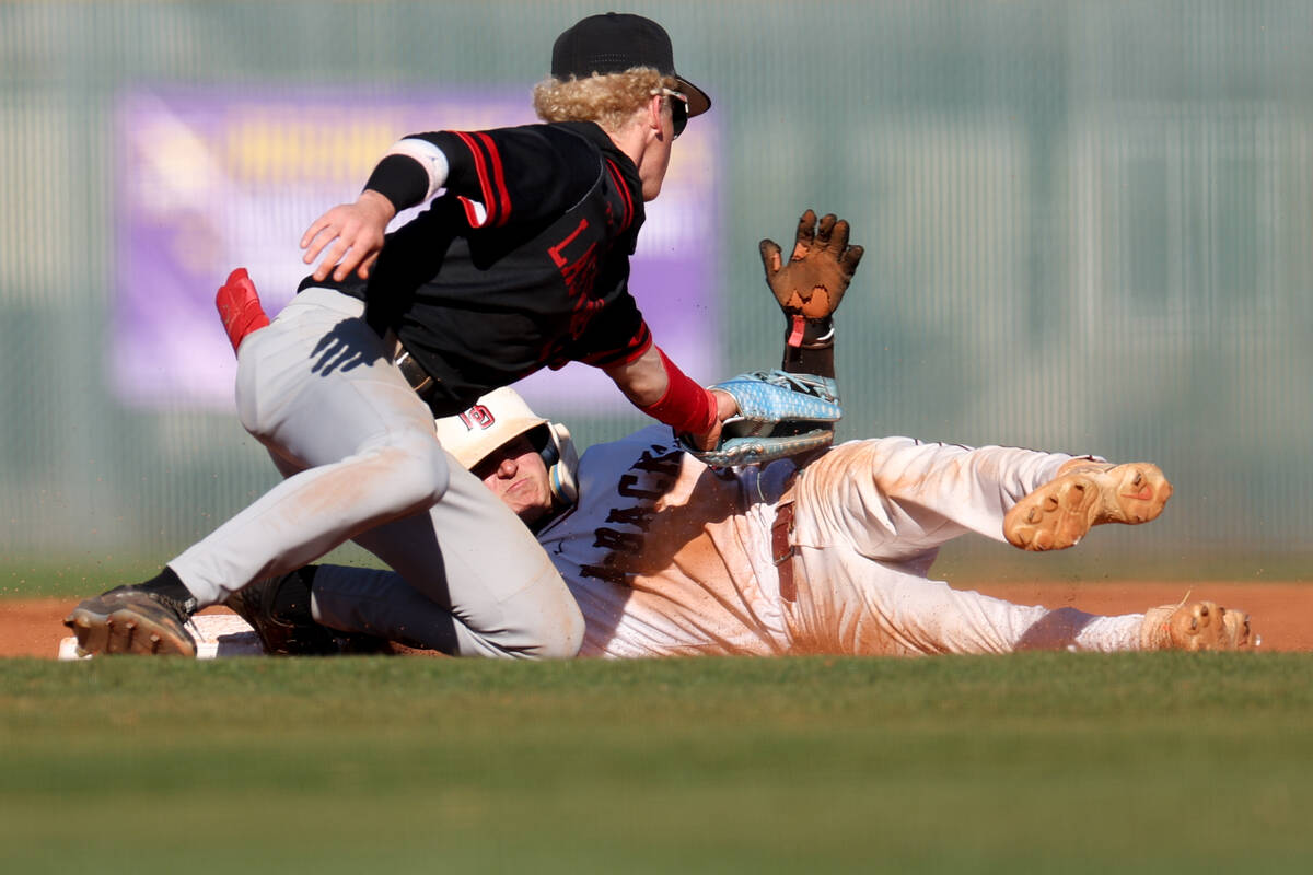 Las Vegas’ second baseman Kyle Iverson attempts to out Desert Oasis’ Ryan Martin ...