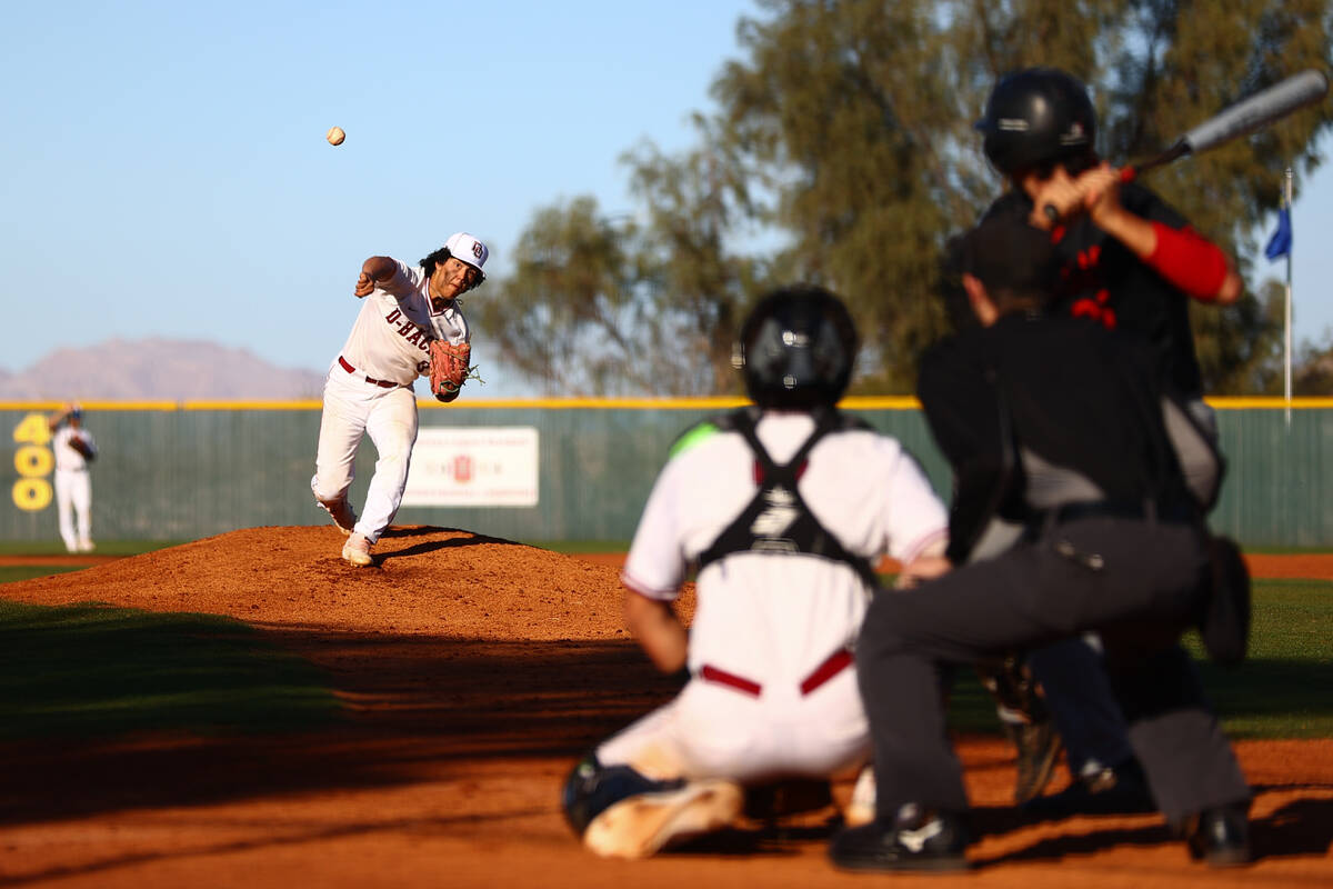 Desert Oasis pitcher Sebastian Frye throws to Las Vegas during a high school baseball game at D ...