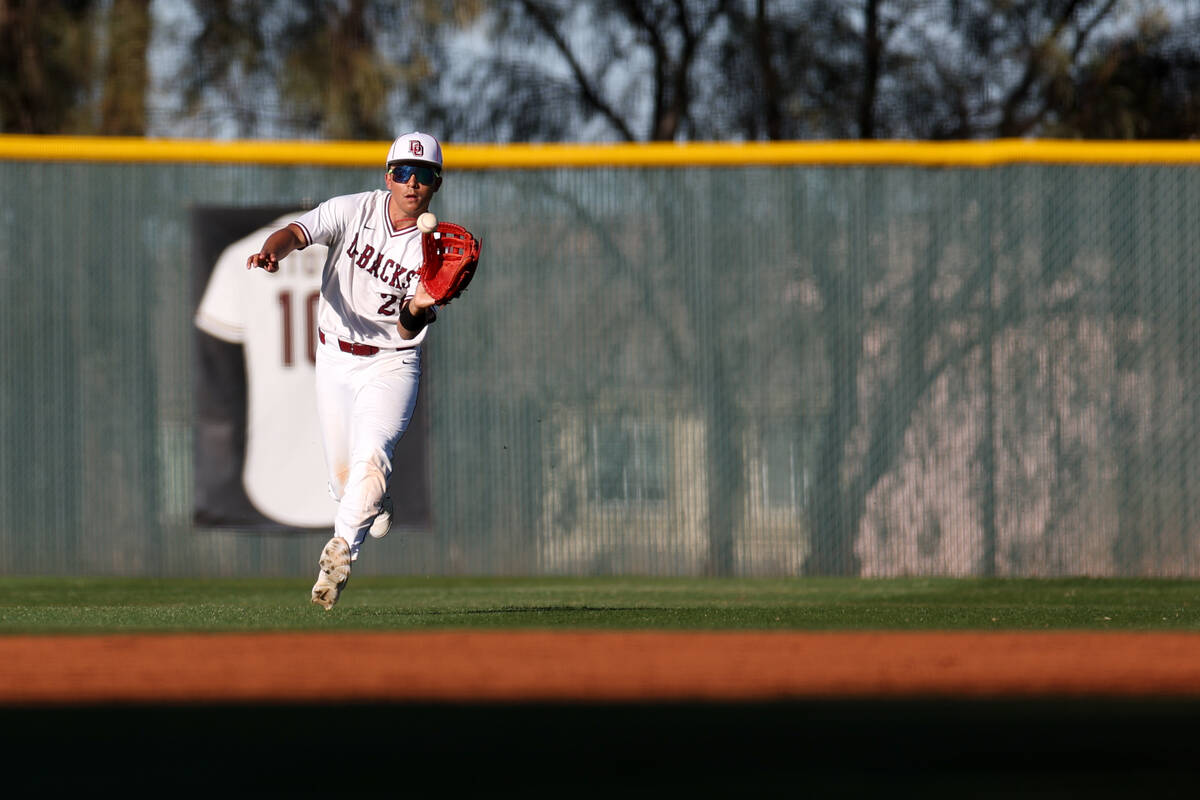 Desert Oasis outfielder Noah Griffith catches for an out on Las Vegas during a high school base ...