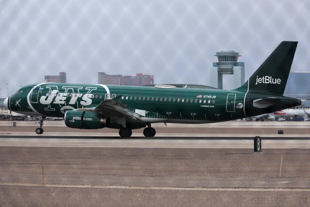 A JetBlue plane arrives to Harry Reid International Airport in Las Vegas, Tuesday, Feb. 14, 202 ...