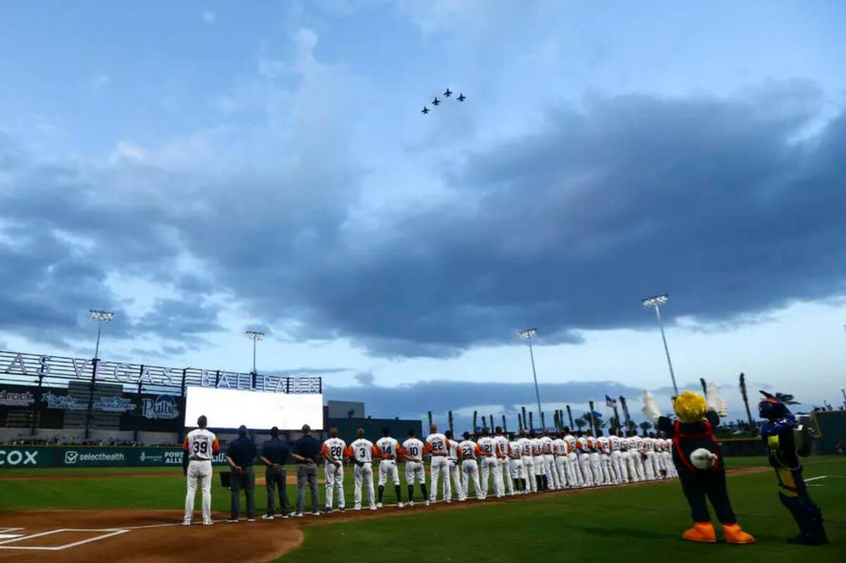 Nellis Air Force Base pilots fly over the field before the start of the Las Vegas Aviators' hom ...
