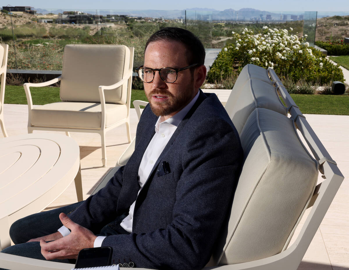 Ryan Smith, director of economic development for the City of Las Vegas, talks to a reporter dur ...