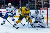 Golden Knights center William Karlsson (71) looks to take a shot against Tampa Bay Lightning go ...