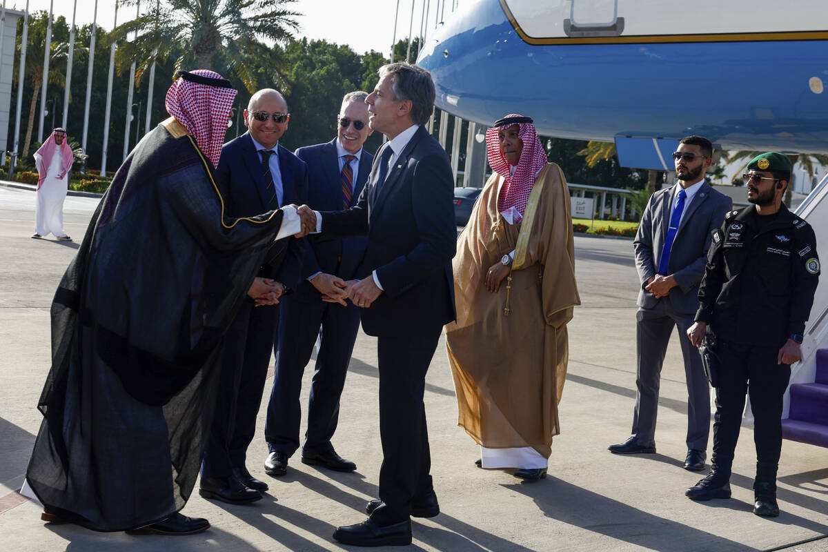 U.S. Secretary of State Antony Blinken walks arrives in Jeddah, Saudi Arabia, Wednesday, March ...