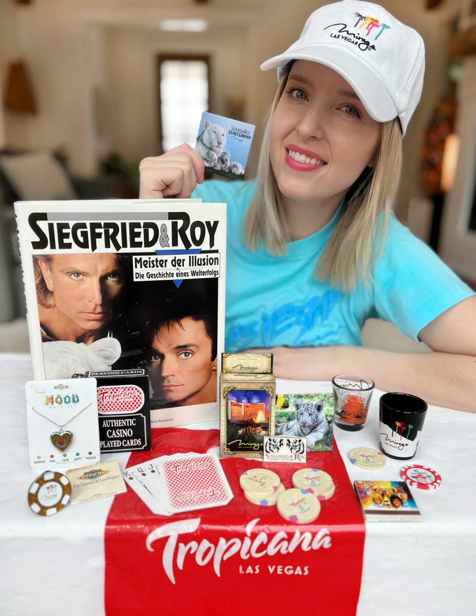 Las Vegas native Holly Vaughn poses with merchandise she bought to collect from The Mirage and ...
