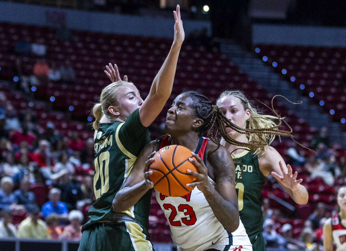 UNLV Lady Rebels center Desi-Rae Young (23) looks for a shot opportunity against Colorado State ...