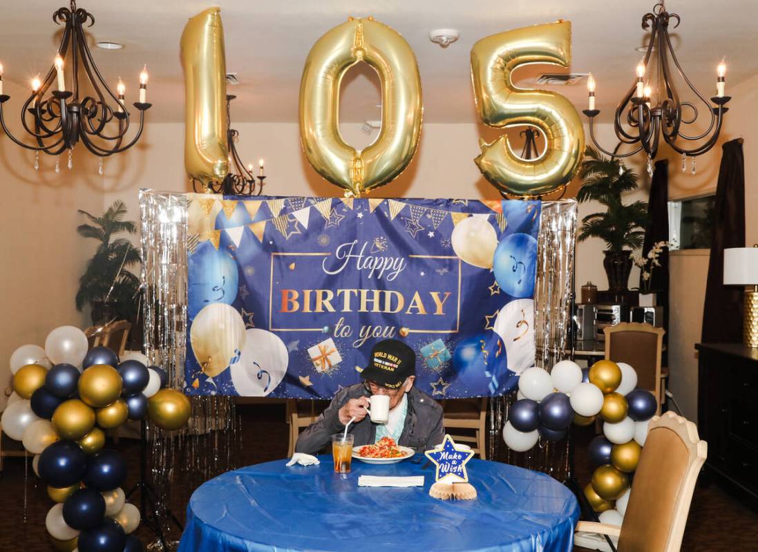 Roy Hashimura, a WW2 veteran, eats lunch at his 105th birthday celebration at Sterling Ridge Se ...