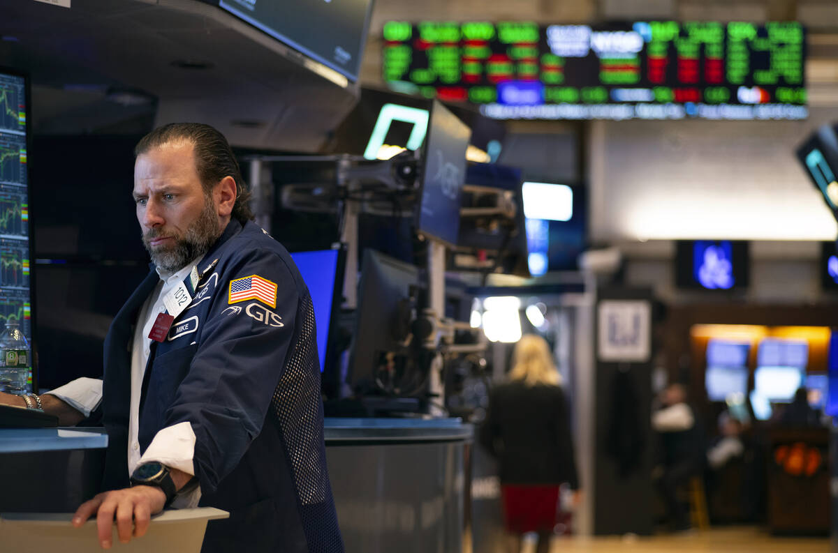 A trader works on the floor of the New York Stock Exchange Wednesday, March 20, 2024. (AP Photo ...