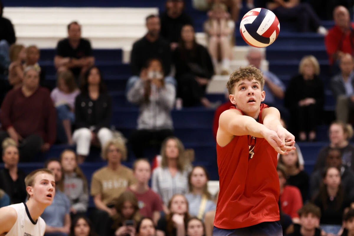 Coronado libero Deacon Menlove bumps the ball during a boys high school volleyball match agains ...