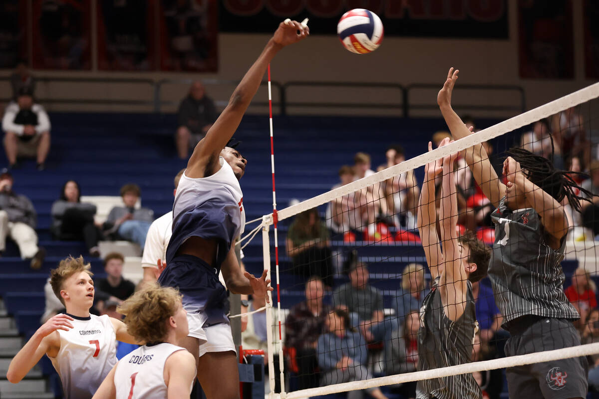 Coronado middle blocker Jayden Bell spikes to Arbor View during a boys high school volleyball m ...