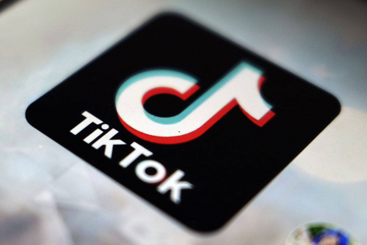 FILE - In this Monday, Sept. 28, 2020 filer, a logo of a smartphone app TikTok is seen on a use ...