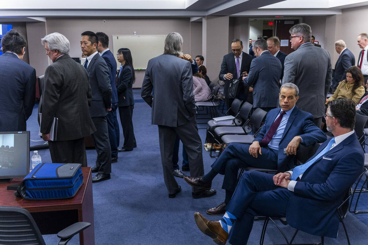 Attendees await the start of the Nevada Gaming Commission meeting on Thursday, March 21, 2024, ...