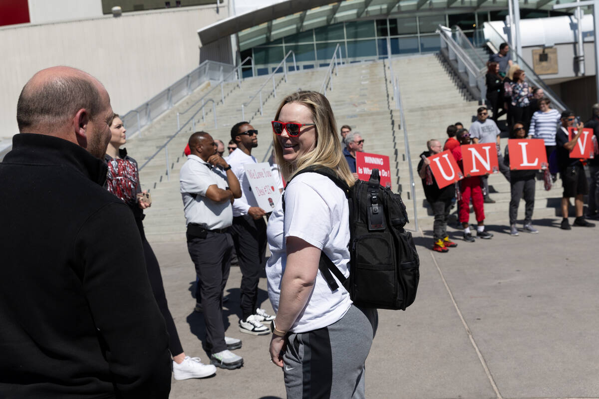 UNLV Lady Rebels head coach Lindy La Rocque, right, chats with UNLV head football coach Barry O ...