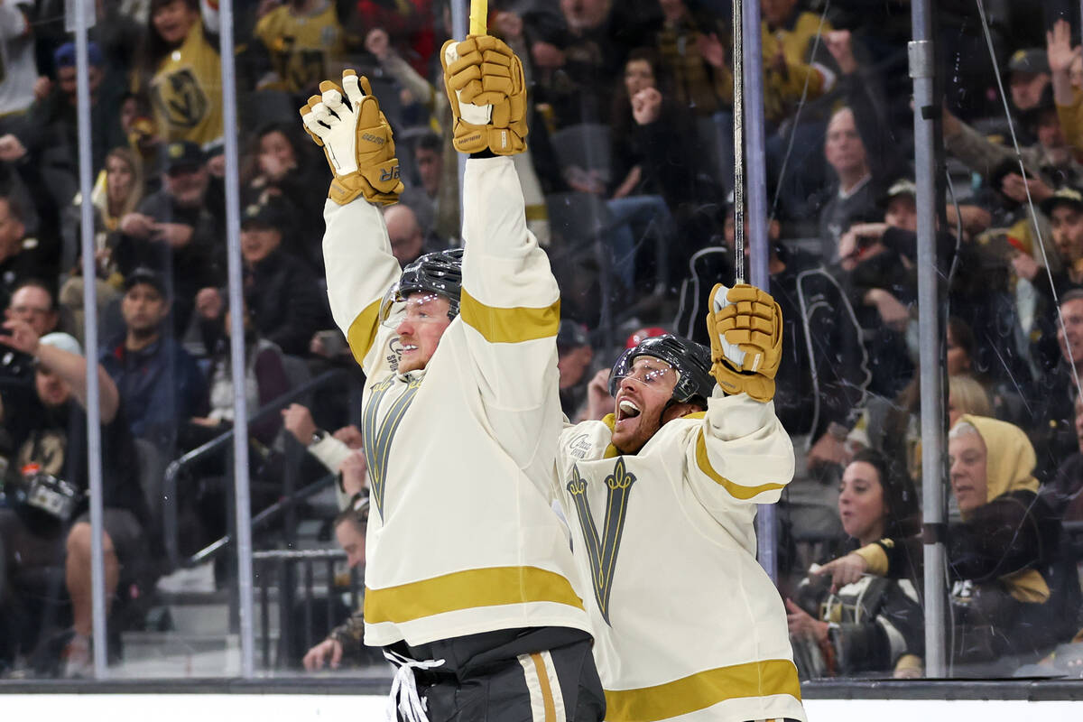 Golden Knights center Jack Eichel, left, and right wing Jonathan Marchessault celebrate Eichel& ...