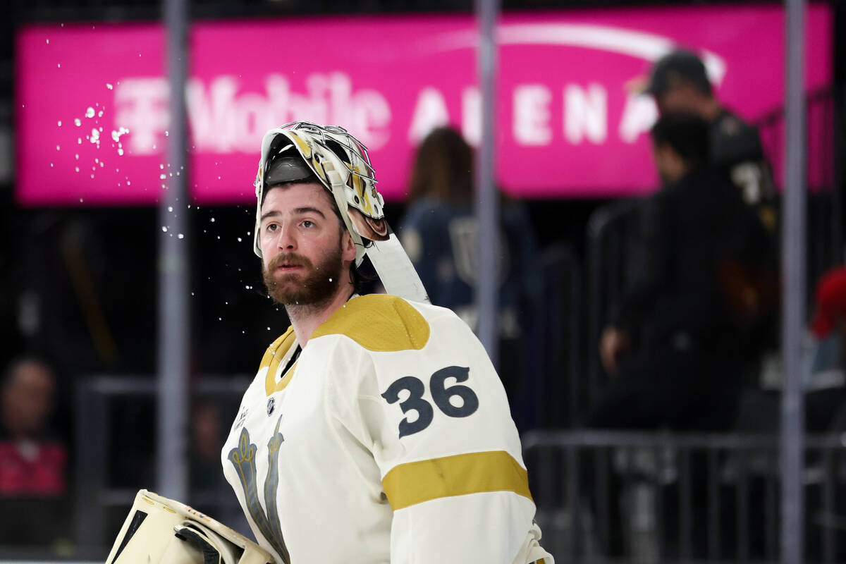 Golden Knights goaltender Logan Thompson (36) spits water during the second period of an NHL ho ...