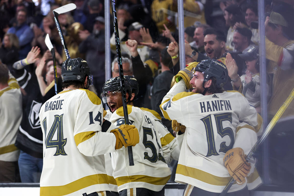 The Golden Knights celebrate a goal during the third period of an NHL hockey game against the K ...