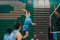 Foothill outside hitter Hayden Mauro (7) slams the ball over the net during a game against Palo ...