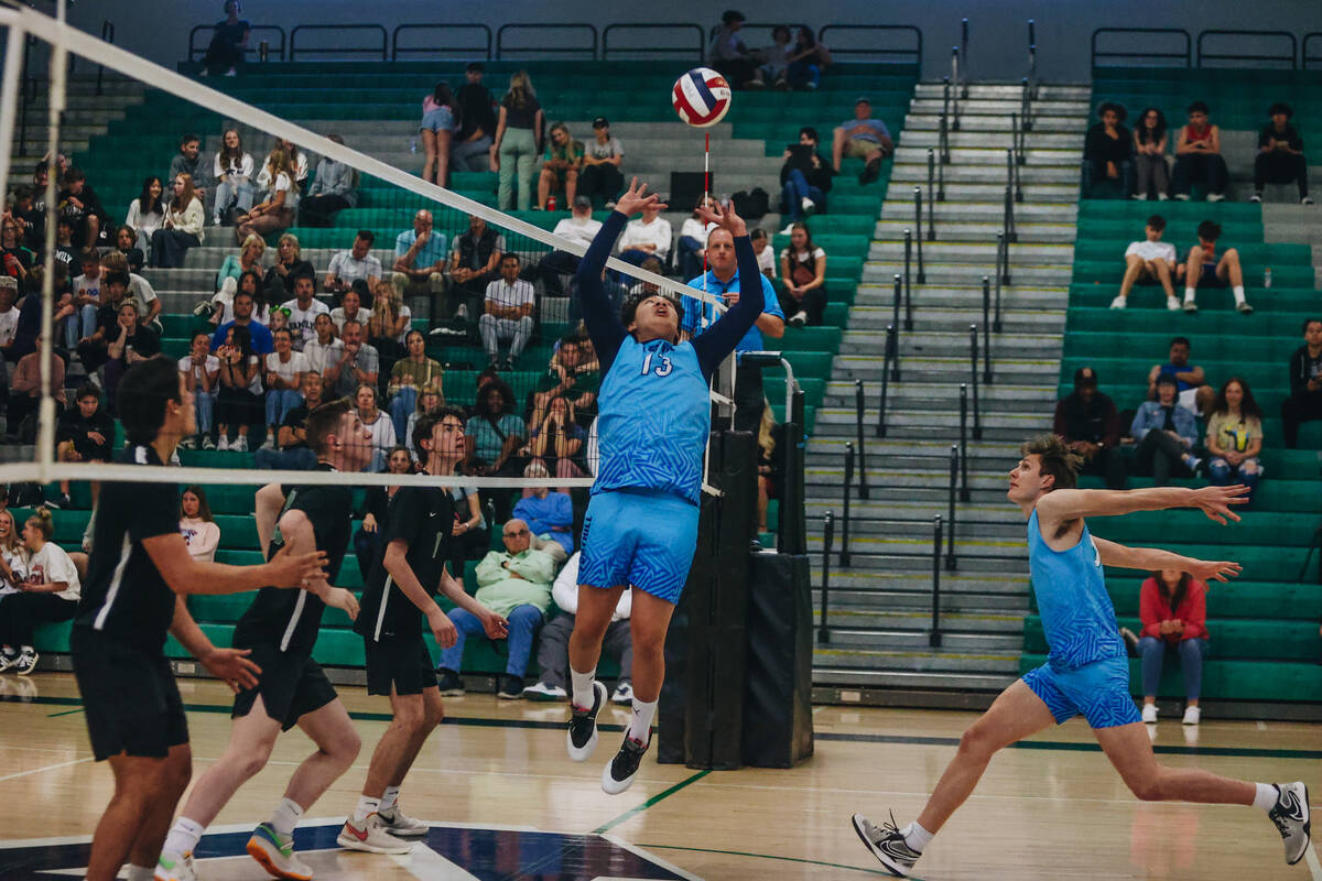 Foothill setter Jayden Ellizar-keiki (13) jumps up to bump the ball during a game against Palo ...