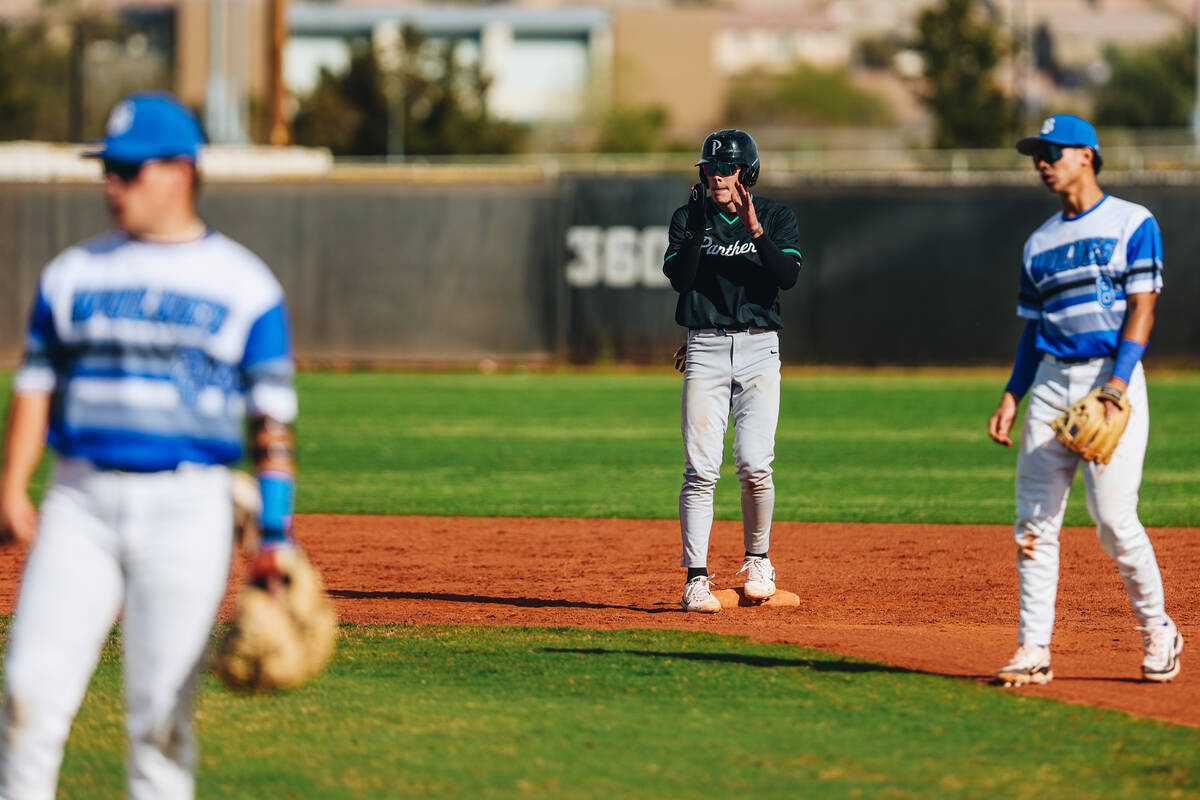 Palo Verde infielder Andrew Kaplan (15) claps for a teammate from second base during a baseball ...