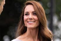 FILE - Britain's Kate, Duchess of Cambridge poses for photographers at The Earthshot Prize Awar ...